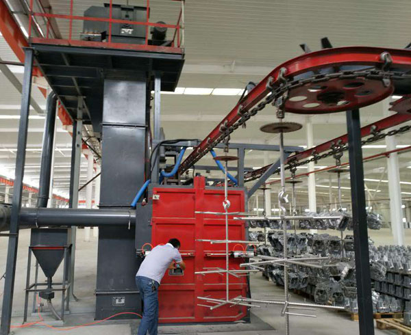 吊鉤通過拋丸機(jī)